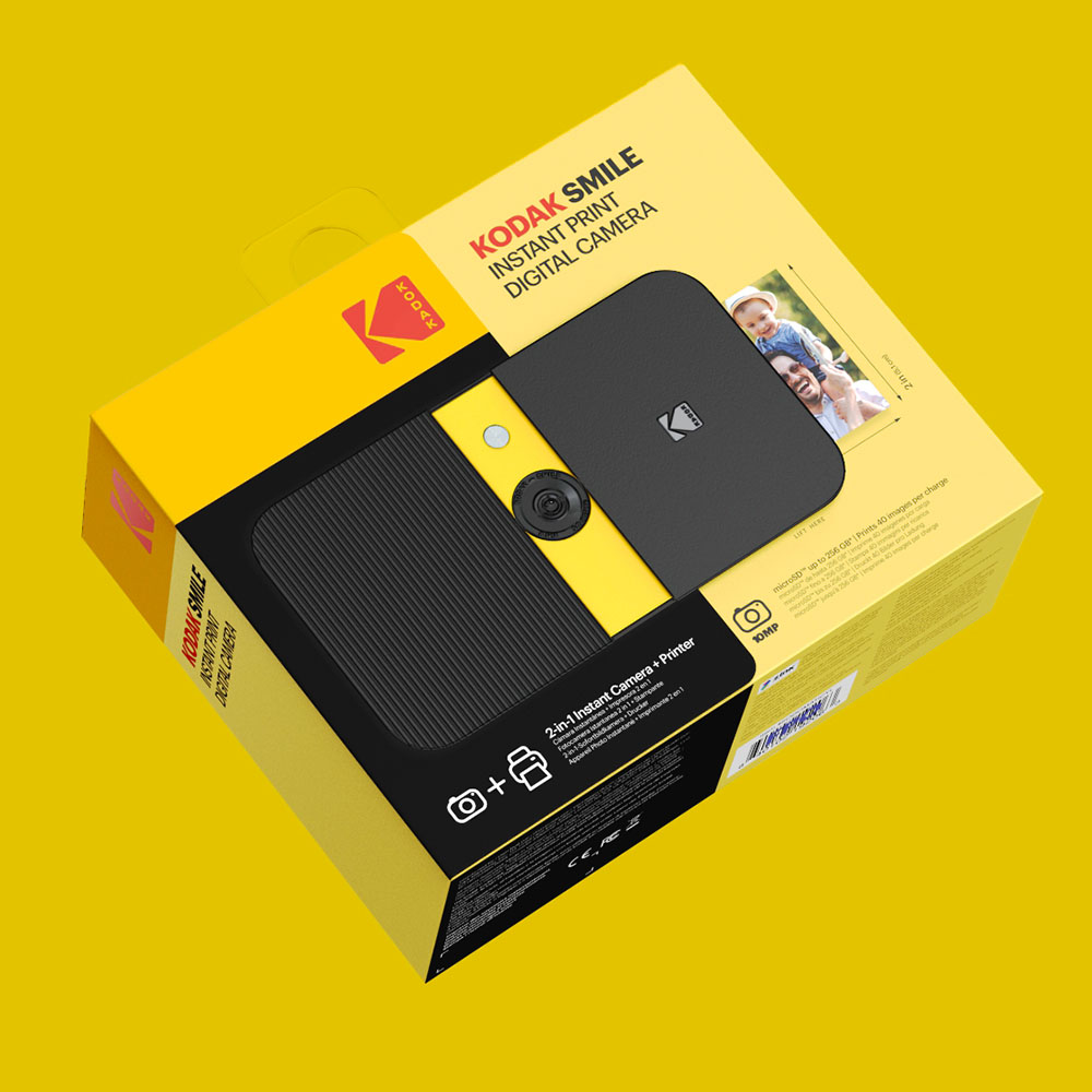 Angled packaging for the Kodak Smile, floating on a yellow background